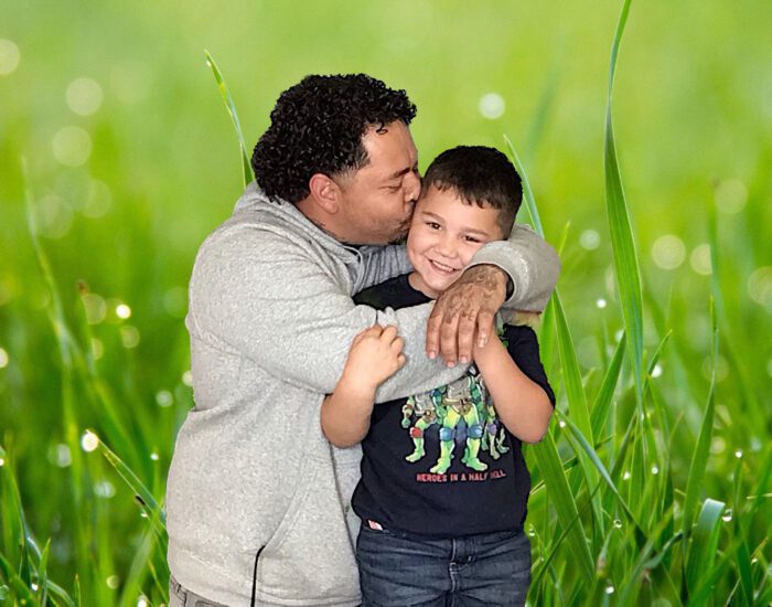 Father hugging his son