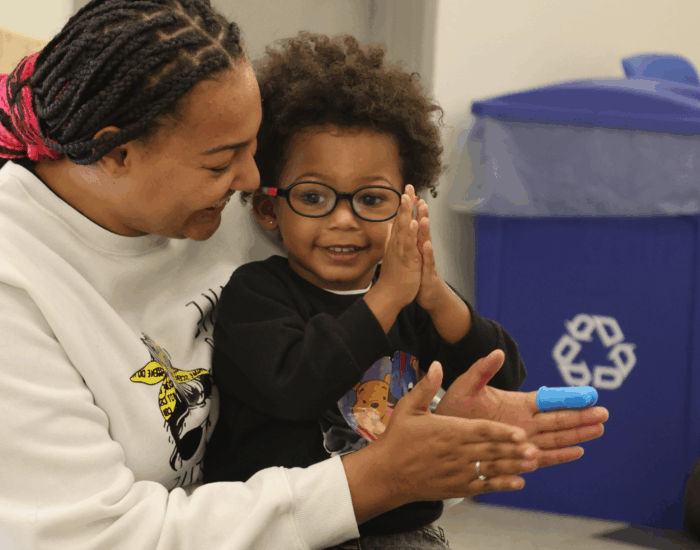 Teacher working with child